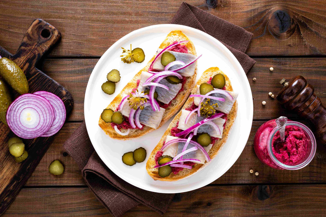 Pickled Herring with Beet Dip Crostini